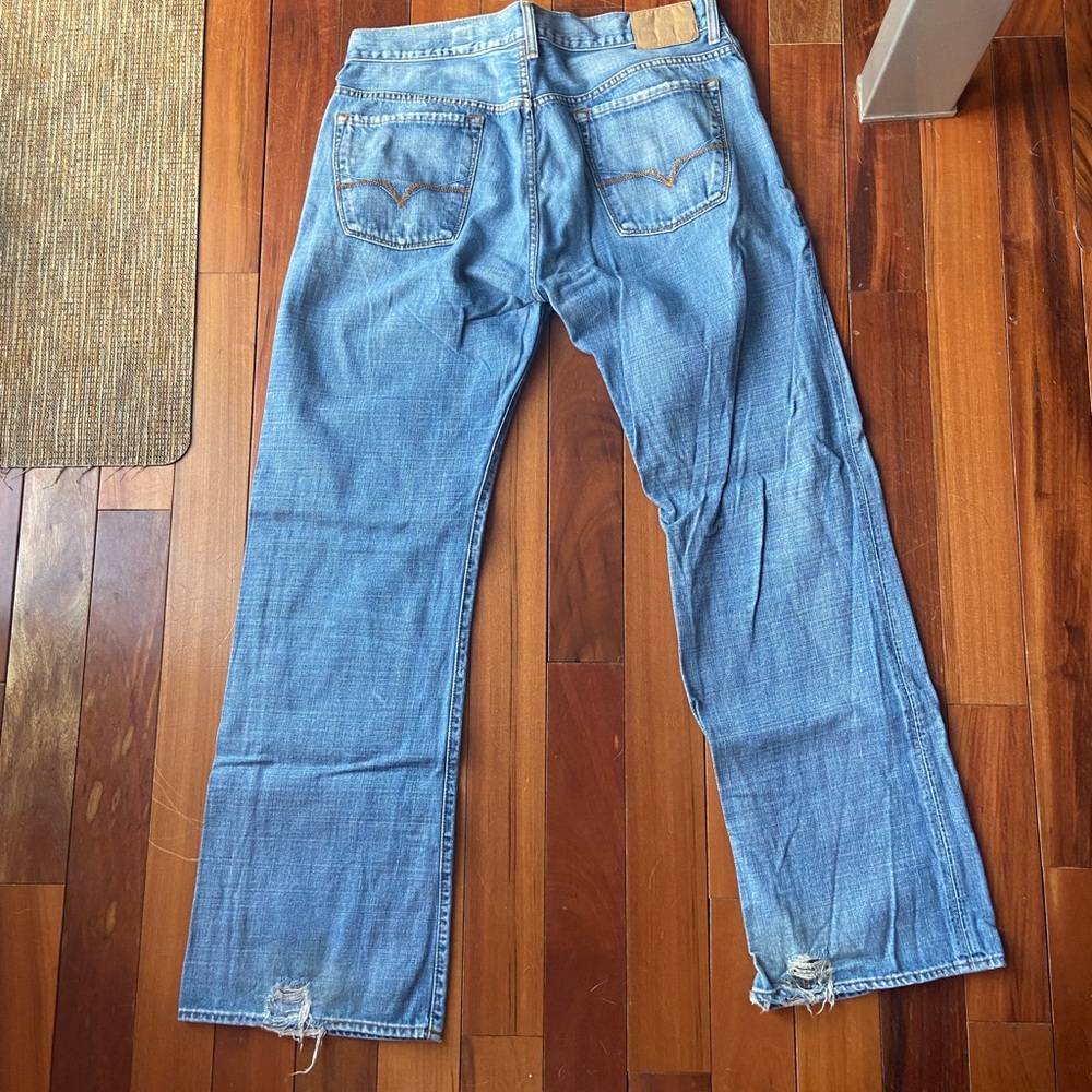 Guess denim jeans men. Size 34 waist. Boot fit.